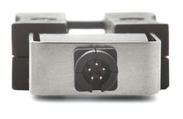 The image shows a metallic plug with a round socket that has five metallic contacts. The plug is framed in a gray holder with black edges.