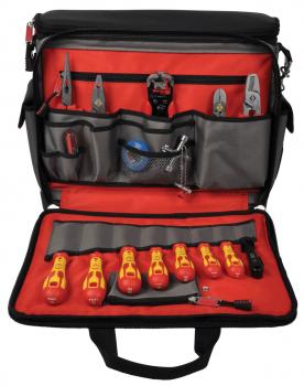 The image shows a tool bag with a red lining. It contains various tools such as pliers, screwdrivers, and a ruler, neatly arranged in compartments.
