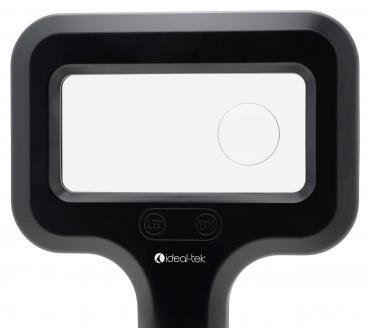 The image shows a black magnifying glass with a rectangular lens and two buttons below it. The top edge is rounded, and the bottom has a wide, ergonomic shape.