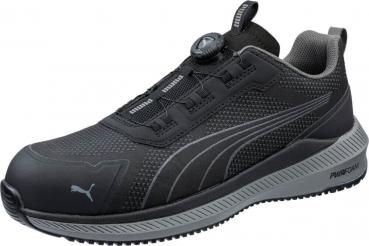 The shoe is a sporty sneaker in black with gray accents. It has a breathable upper and a comfortable sole. A quick lacing system makes it easy to put on.