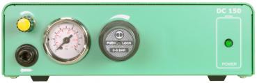 The image shows a green device with a round pressure gauge, a black button labeled "PUSH LOCK," and a green on/off light on the right side.