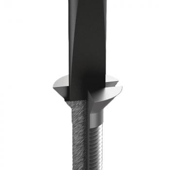 The image shows a metallic drill with a narrow, pointed blade. The drill has a spiral structure and a smooth, shiny surface.
