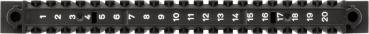 The image shows a black, elongated component with letters and numbers on one side. Along the edges are connection pins used for linking.