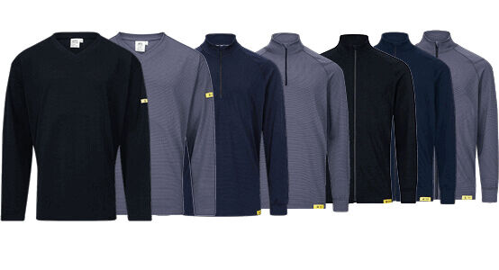 Das Bild zeigt ein langärmeliges, schwarzes Shirt mit V-Ausschnitt. Es hat eine strukturierte Oberfläche und ein gelbes Detail an einem Ärmel. Der Stil ist schlicht und modern.