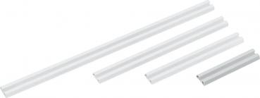 The image shows several white, elongated plastic profiles of varying lengths. They are smooth and narrow, with a rectangular cross-sectional shape.
