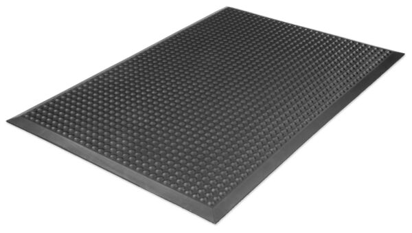 Das Bild zeigt eine schwarze, rutschfeste Matte mit einer strukturierten Oberfläche aus kleinen Erhöhungen. Rechts sind Hinweise zum maßgeschneiderten Zuschnitt abgebildet.