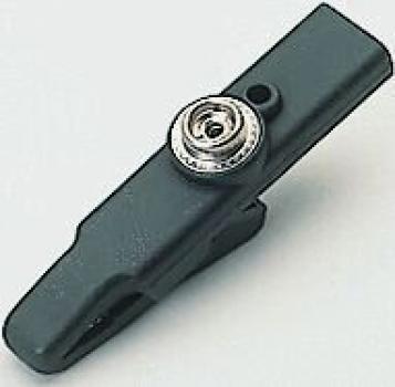 The image shows a black plastic clothespin. It is elongated and has a round metal spring at one end. The clip is intended for holding laundry.