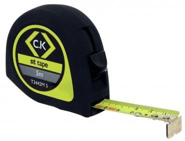 In the picture, there is a tape measure visible. It has a black, rubberized casing with yellow and gray details. The tape measures up to 3 meters and is partially extended.