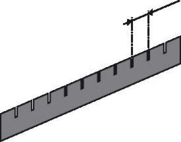 The image shows a ruler with several markings. At the end, there are two small vertical lines indicating the measurement. The background is gray, and the ruler is flat.