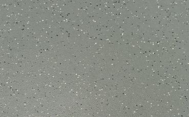 The surface is finished in a matte gray tone, with many small, shiny particles in black and white that are irregularly distributed. It appears structured and modern.
