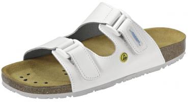 Der Schuh ist eine weiße Sandale mit breiten Riemen und zwei praktischen Klettverschlüssen. Die Sohle ist aus braunem Leder und hat ein ergonomisches Design für Komfort.