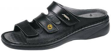 The shoe is a white, open sandal with a flat heel. It has three adjustable Velcro straps on the top and a padded insole for comfort.