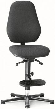 The chair has a black fabric cover and a high, ergonomic backrest. The seat is also black and mounted on a swivel base with five casters. There is a footrest.
