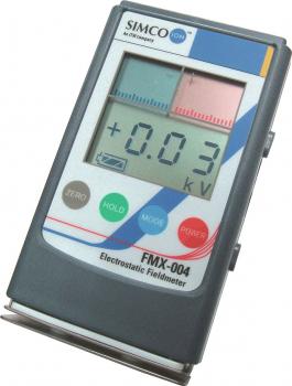 The image shows a handy device for measuring electric fields. It features a large digital display with numbers and buttons in various colors. The casing is black with blue, red, and green details.