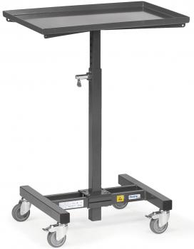 The image shows an adjustable-height serving table with a rectangular, flat surface. It stands on a sturdy frame with four casters, which allow for mobility.