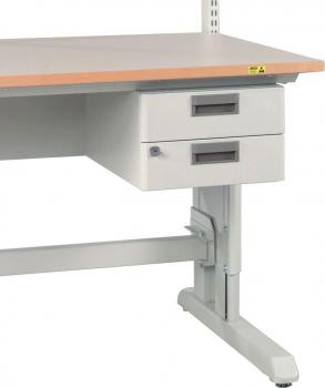 The image shows an adjustable-height table with a light wood top. Below it are two gray drawers, centrally arranged. The table has sturdy legs.