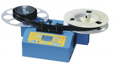 The image shows a blue device with two large, round coils. It has a control interface with buttons and a display. One coil is dark, the other is light.