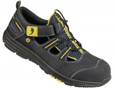 The image shows a black sports shoe with yellow and gray tones. It features a breathable design, quick lacing, and an adjustable strap over the instep. The sole is stable and slip-resistant.