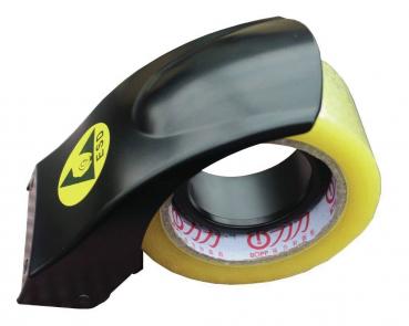 Das Bild zeigt einen Tesa-Abroller in schwarzer Farbe mit einem gelben Logo. Er hält eine Rolle gelbes Klebeband, das leicht transparent ist. Der Abroller hat eine ergonomische Form.