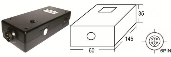 The image displays an elongated, black device with rounded contours. It features a lateral connection port and a top surface with a small rectangular indentation. Next to it, there is a technical sketch of the device.