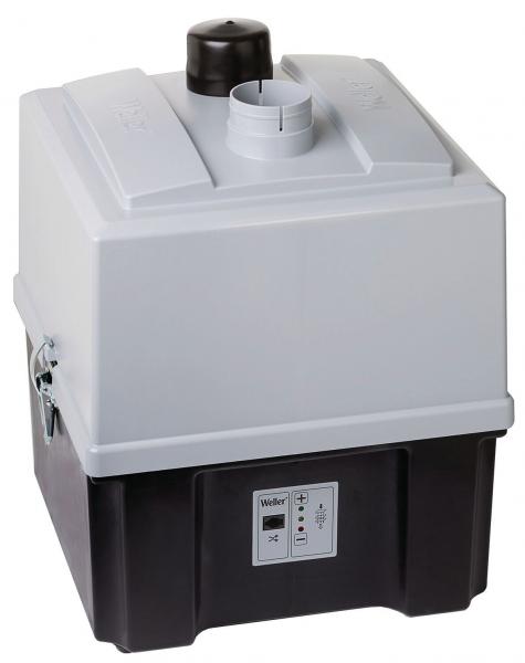 The image shows a compact, square device with a white upper part and a black lower part. At the top, there is a round outlet and a lid. On the front, there are buttons and a display.