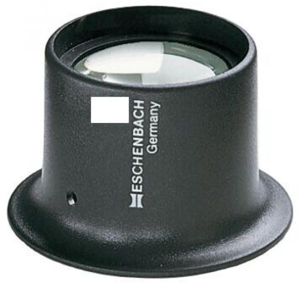 The image shows a black magnifying glass with a rounded base and a large, clear lens on top. On the side, it reads "ESCHENBACH Germany". Ideal for close-up viewing.