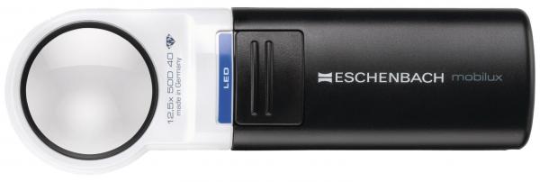 The image shows a digital reading magnifier from Eschenbach. It has a black casing, a large, round lens, and LED lighting for better illumination of the reading material.