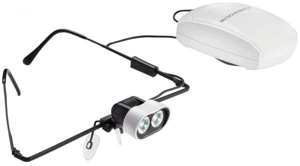 The image shows a special pair of glasses with two small, bright LED lights at the front. Attached to a cable is a white control unit. The glasses have black arms.
