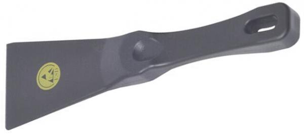 The image shows a narrow spatula with a flat, broad end and a long, ergonomic handle. The handle has a hole for hanging. The color is predominantly dark gray.
