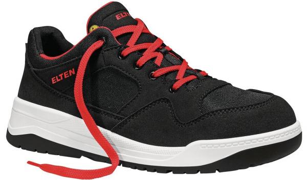 The shoe is black with red laces. It has a sporty shape, padded areas, and a white sole. The materials appear sturdy and functional.