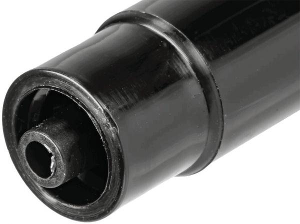 The image shows a black, cylindrical object with a slightly raised edge. At one end, there is a round opening that is hollow inside. The surface is smooth and shiny.