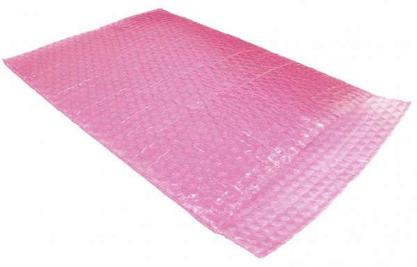 The image shows a large, rectangular bubble wrap in bright pink. The surface is covered with many small, round air bubbles that make a noise when pressed.