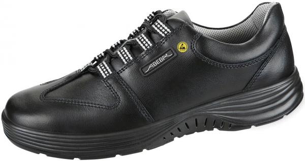 The shoe is black with a sporty design. It has a smooth leather surface, non-slip sole, and elastic laces. The interior provides good support and comfort.