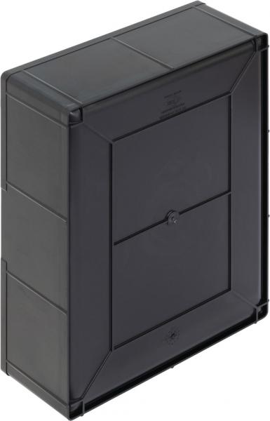 The image shows a black, rectangular box with rounded corners and a smooth surface. On the front, there is a square flap in the middle.