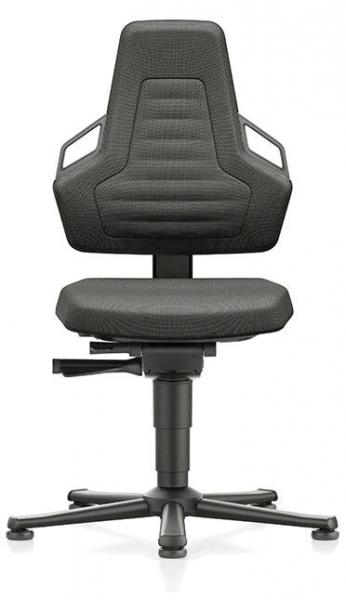 The office chair is black and features an ergonomic backrest with cutouts. The seat is padded, and the chair has casters as well as a height adjustment.