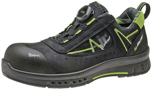 The shoe is black with green accents. It has a firmer, non-slip sole and a protective toe cap. Upper made of breathable material with a quick lacing system.