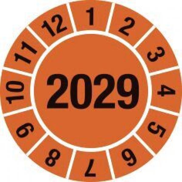 The image shows a round sticker with an orange background. In the center is the large number "2029". Around it, the numbers 1 through 12 are arranged.