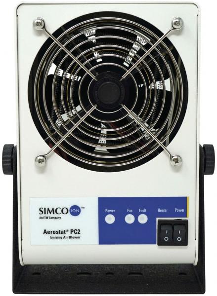 The image shows an electrical device with a larger round fan in the center, surrounded by a rectangular casing. It has switches and LED indicators at the lower center, as well as a reference to the brand "SIMCO".