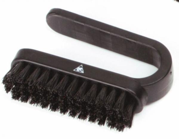 The image shows a black brush with a curved handle. The bristles are short and tightly arranged, ideal for scrubbing or cleaning surfaces.