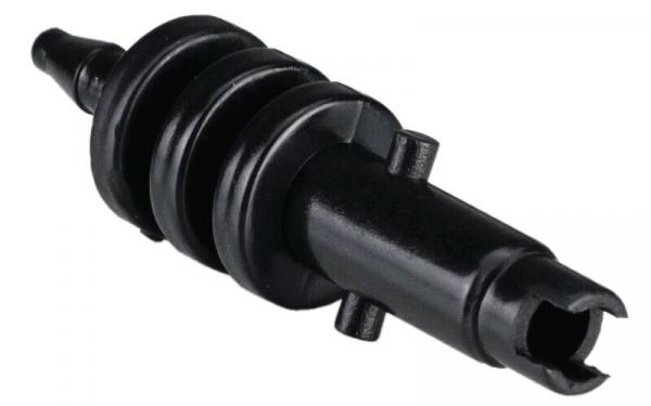 It is a black, elongated object with several round, profiled elevations in the middle. At one end, there is an opening that looks like a connector.