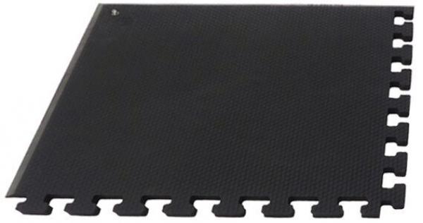 The image displays a square, black carpet tile piece with serrated edges. The surface is textured and slip-resistant, ideal for various floorings.