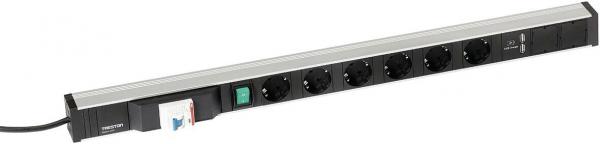 The image shows a black power strip with six outlets. It has a narrow, elongated shape and is made of metal. There is a green switch on the front.