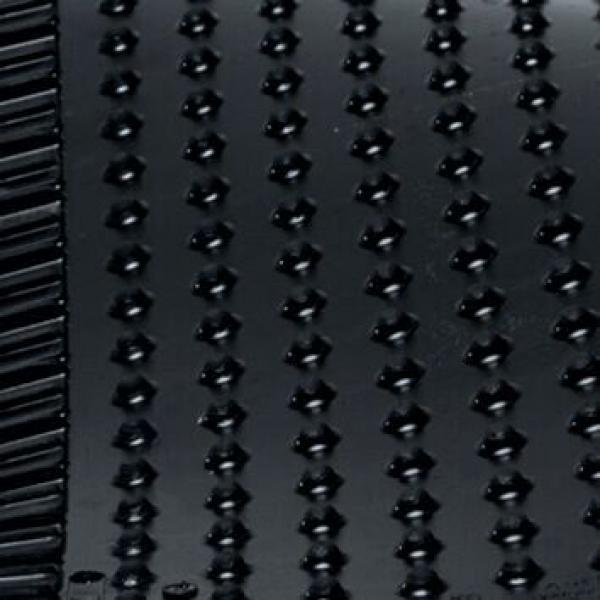 Das Bild zeigt eine schwarze Oberfläche mit gleichmäßig angeordneten, kleinen, erhöhten Punkten, die in vertikalen Reihen angeordnet sind. Die Struktur wirkt texturiert und matt.