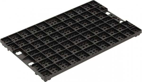 The image shows a rectangular, black plastic palette with many small square openings. The surface is flat and the edges are slightly rounded.