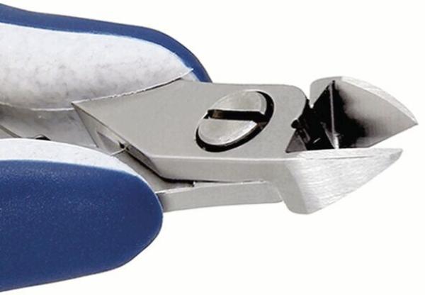 The image displays an electric nail clipper. It features a metallic handle with blue rubber inserts and an angled, sharp blade. The blade opens when operated.
