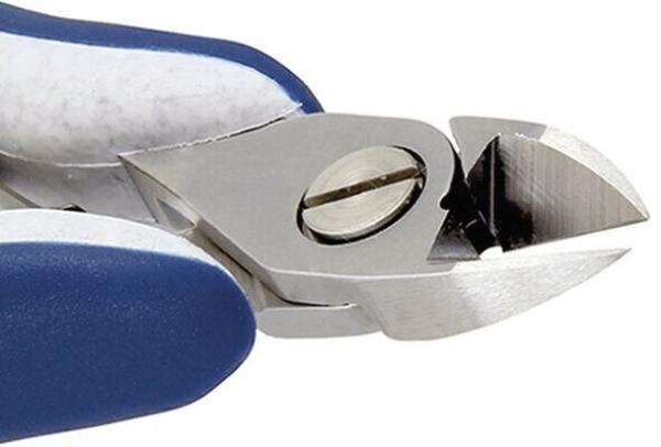 The image shows a side view of a nail clipper. The cutting edges are sharp and slightly curved. The handle is blue with a rubberized surface for better grip.