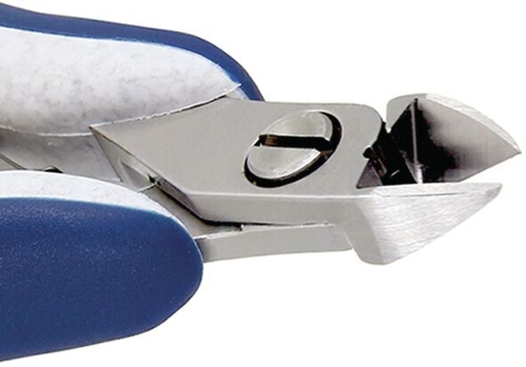 The image shows a nail clipper with a shiny, sharp blade. The handle has a blue and white color scheme. It is compact and used for trimming nails.