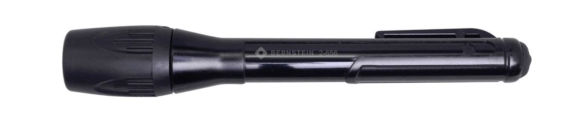The image shows a black flashlight with a round head and a slender body. It has a clip on the side for easy carrying. The surface is smooth and shiny.