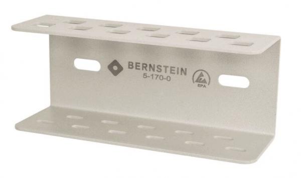 The image shows a white holder with two horizontal shelves. It has several holes and a sturdy, rectangular shape. Ideal for storing tools or equipment.