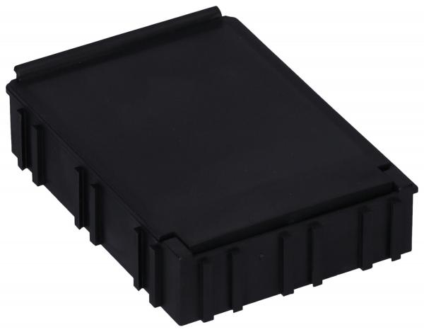 It is a black, rectangular box with slightly rounded edges. The surface is smooth, and the sides are structured with grooves. It appears sturdy and functional.